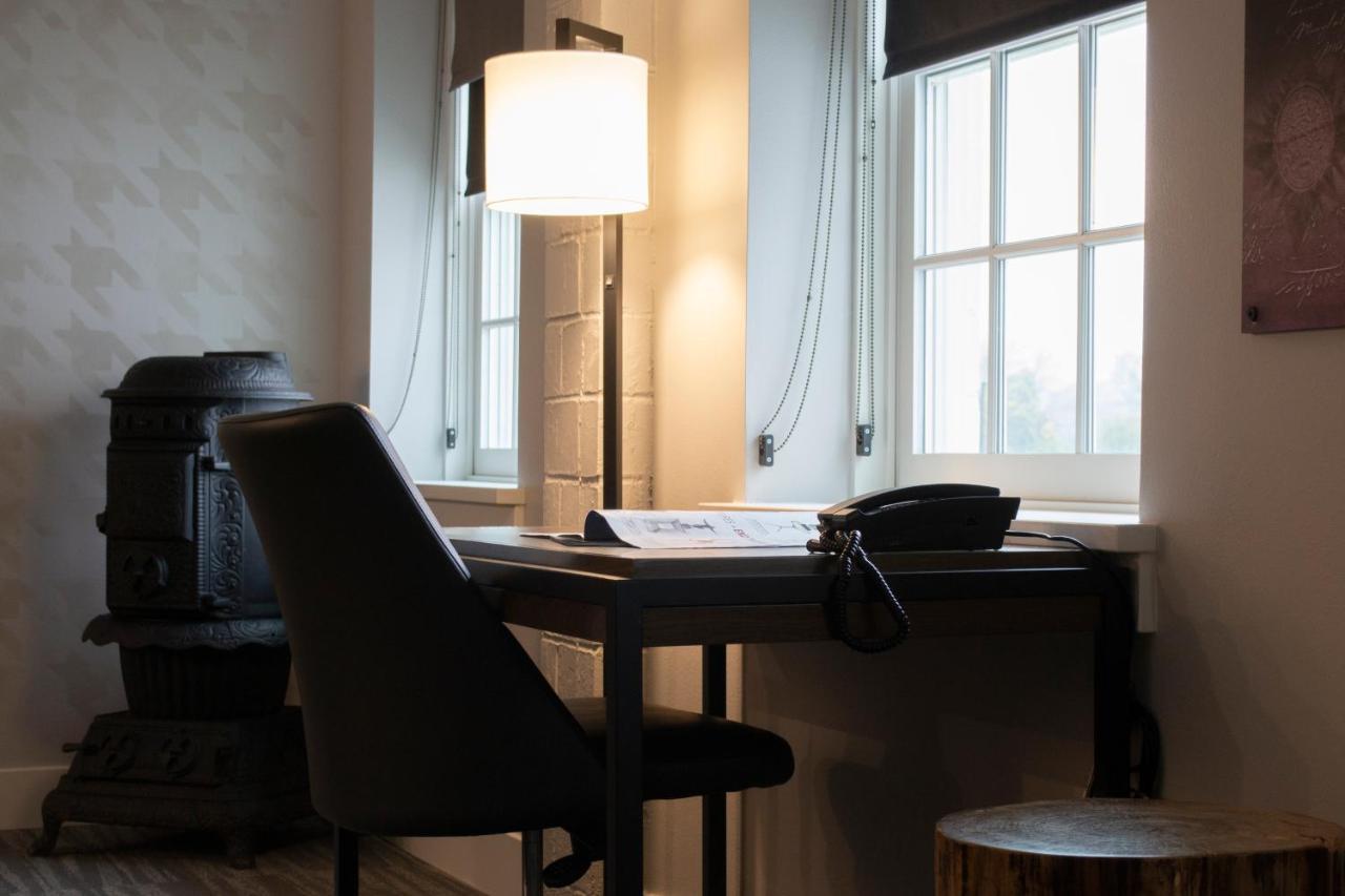 Hotel Millwright Amana Bagian luar foto